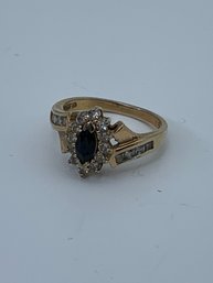 Gold Plated Sterling Silver Ring With Oval Black Center Stone Accened By Small Clear Stones, Marked 925 3.9g