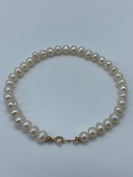 White Natural Pearl Strand Bracelet With 14K Gold Clasp, 7 Inches