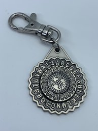 2003 Scholastic Inc Code Machine Keychain, Silver Plated Metal Spinner Medallion, 1.5 Inches