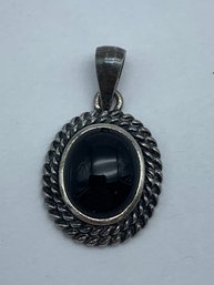 Solitaire Oval Onyx Pendant With Sterling Silver Rope Style Setting, Marked 925TH,3/4-Inch, 2.2g