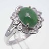 18K White Gold And Diamond Cabochon Icy Jadeite Ring