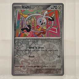 Klefki Surging Sparks Reverse Holo Pokemon Card