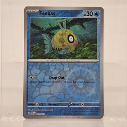 Feebas Surging Sparks Reverse Holo Pokemon Card