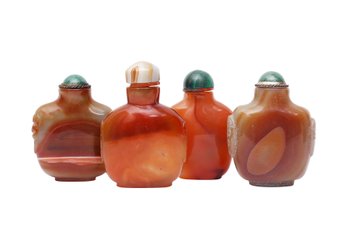 FOUR CHINESE AGATE SNUFF BOTTLES