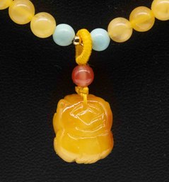 Carved Amber Pendant With Amber Bead Necklace