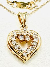 14 Karat Yellow Gold Natural Diamond Heart Pendant And Chain - J11596