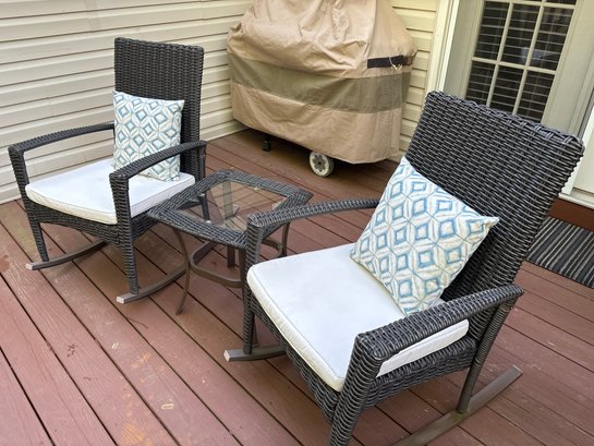 Two Patio Rockers And A Table