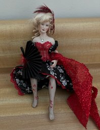 Doll In Red And Black Dress