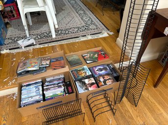 Big Collection Of DVDs And Racks