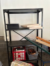Black Shelving Unit With Craftsman Shop Vac And More
