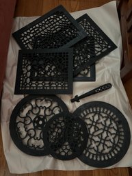 Seven Vintage Grates And Grate Lifter