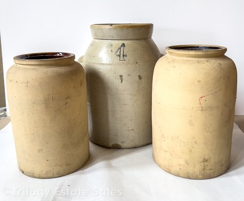 Three Stoneware Crocks Including 4 Gallon