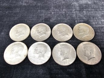 Eight 1964 Kennedy Silver Half Dollars