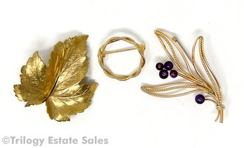 Three Gold-Tone Costume Jewelry Brooches