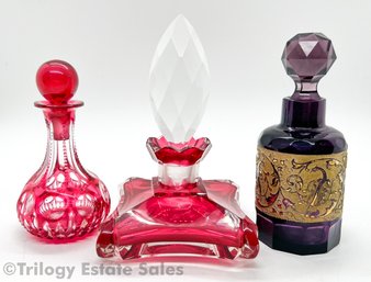 Three Red & Amethyst Perfume Bottles