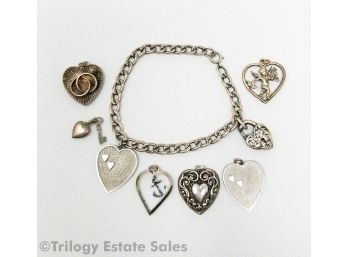 Sterling Silver Charm Bracelet With Locking Heart And Heart Charms