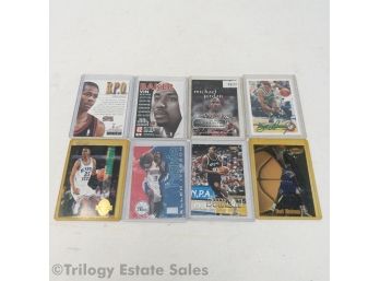 Assorted Basketball Cards In Top Loaders