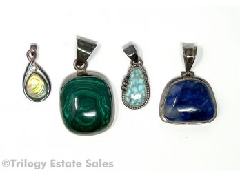 Four Semi-Precious Stone Pendants Set In Sterling Silver