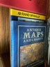 Stack Of Atlas, Maps, And Other Books.