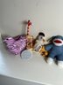 An Assortment Of Whimsical Small Stuffed Animals & Toys