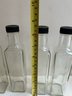 Set Of Six 8.5' Tall Glass Bottles With Plastic Caps