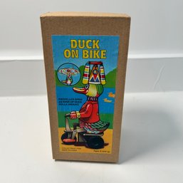 Duck On Bike: Tin Propeller Wind Up Duck Toy