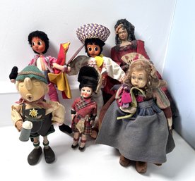 A Grouping Of Cultural Dolls & Figurines