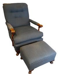 A Quality Upholstered Arm Chair With Matching Ottoman & Carved Arms