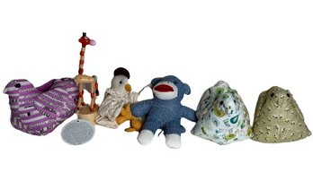An Assortment Of Whimsical Small Stuffed Animals & Toys