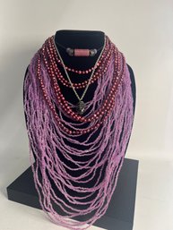 Variety Of Purple Necklaces Ranging In Size And Style. Lot #11