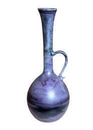 A Beautiful 7 Inch Tall Art Glass Vase With Handle