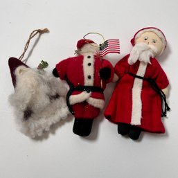 Three Fabric Santa Ornaments