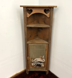 An Adorable Country Style Corner Cabinet With Painted Rabbits