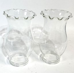 A Pair Of Hurricane Glass Lamp Shades With Scalloped Edges