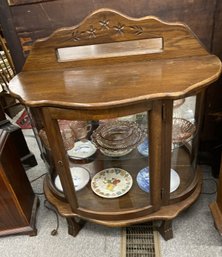 Low Oak Bowed Front Curio Cabinet With Light And Mirrored Back