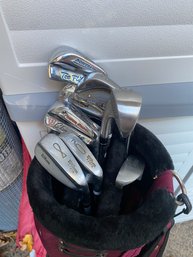 Set Of Wilson And Powerstroke Golf Clubs In Red Carry Bag