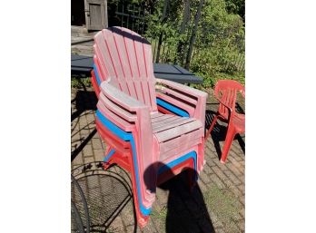 Stack Of Plastic Adirondack  Chairs