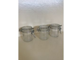 Lot Of 3 Lidded Glass Jars Or Canisters