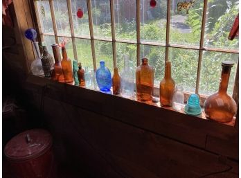 Shelf Full Of Vintage Bottles