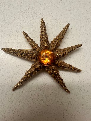 Vtg Huge Starburst Pin About 3.5' CAPRI MFR. 3 1/8 GOLDTONE - Amber Color  STONE