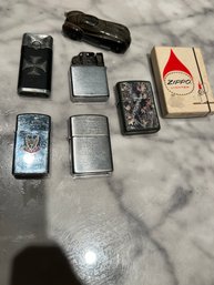 Five Vintage Zippos Plus Extras