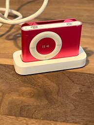 Pink IPod Shuffle With Charging Station