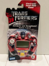 OPTIMUS PRIME Transformers Retro LCD Electronic Hand-Held Video Game Hasbro 2007