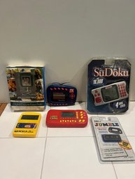 Six Vintage Handheld Games