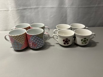 Two Sets Of Four Tea Cups