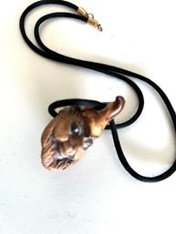 Unusual Character Necklace