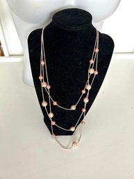 Elegant Three-Strand Rose Gold Style Beaded Necklace