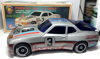 Vintage Battery Operated Porsche 924 Le Mans 1/12 Scale Light Up Bump N Go In Original Box