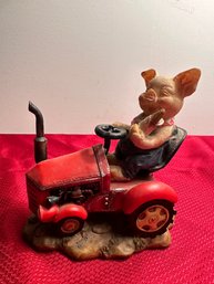 Pig On Tractor Figurine