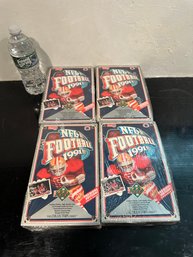 Four Sealed NFL Football Cards Sealed Boxes 1991 Joe Montana